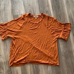 Bell Sleeve Mustard T-shirt from Gimmicks.